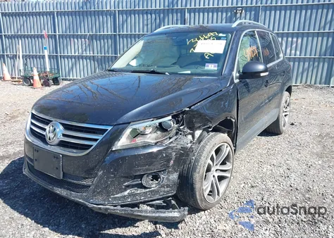 2011 Volkswagen Tiguan Sel из США, поврежденный, VIN WVGBV7AX7BW557398